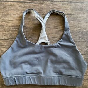 Born Primitive Max Effort Sports Bra size Large. Color is Space, blue